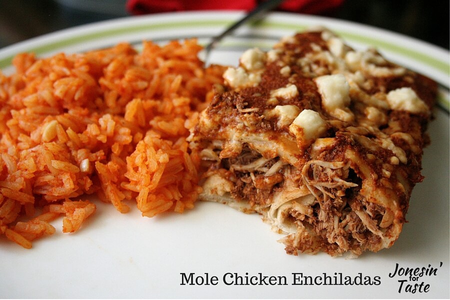 Mole chicken enchiladas are stuffed with deliciously spicy chicken slow cooked in a homemade mole sauce.