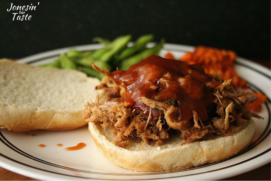 Beef or pork slow cooked in Dr. Pepper is perfectly tender and deliciously topped with a homemade BBQ sauce.