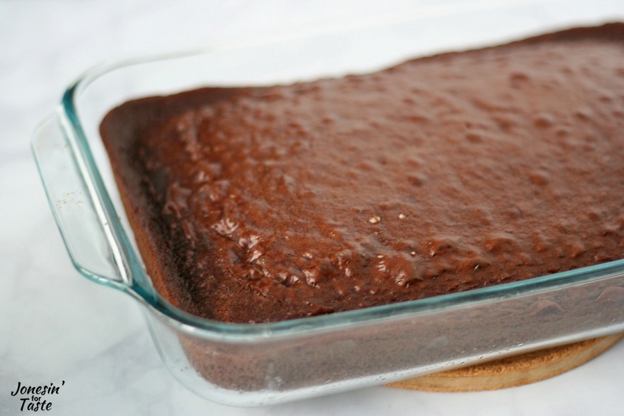 A naked chocolate cake ready to be made into Nutella Poke Cake