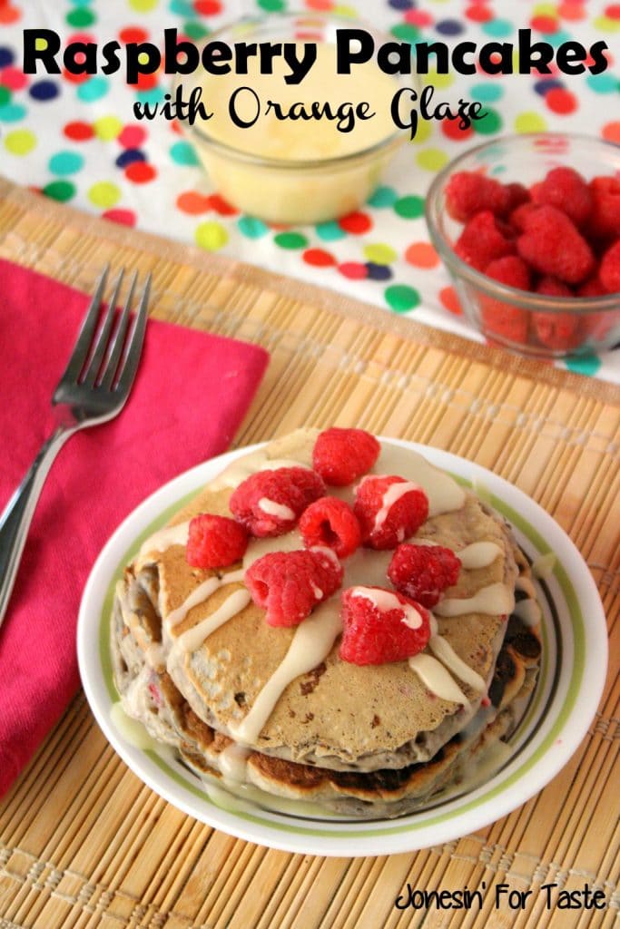 Raspberry Pancakes with Orange Glaze- fresh or frozen raspberries and oranges pair perfectly for these amazing pancakes.