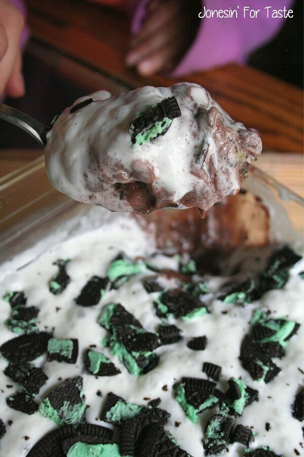 Mint Oreo cookies are topped with chocolate pudding and whipped cream for a simple dessert that is perfect for warmer weather when served straight from the fridge!