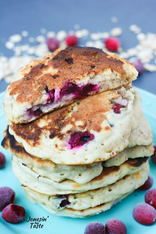 A stack of Oatmeal Cranberry Pancakes on a light blue plate.