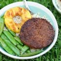 A Teriyaki Veggie Burger Bowl with grilled pineapple and sugar snap peas