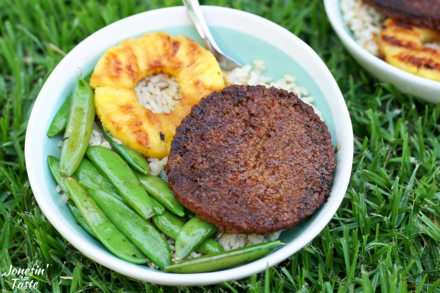 A Teriyaki Veggie Burger Bowl with grilled pineapple and sugar snap peas