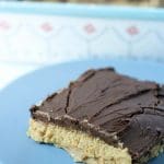 No Bake Peanut Butter Bars have a creamy peanut butter base topped with a simple melted chocolate topping to create an easy homemade no bake Reese's knockoff.