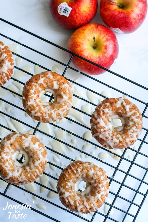 Baked Cinnamon Apple Doughnuts next to envy apples