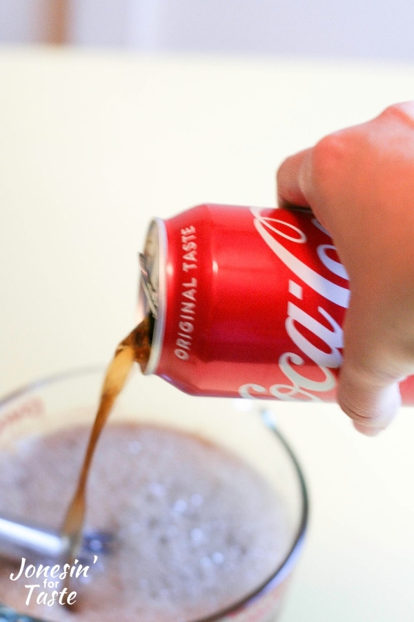 Pouring Coca-Cola into a mixing bowl