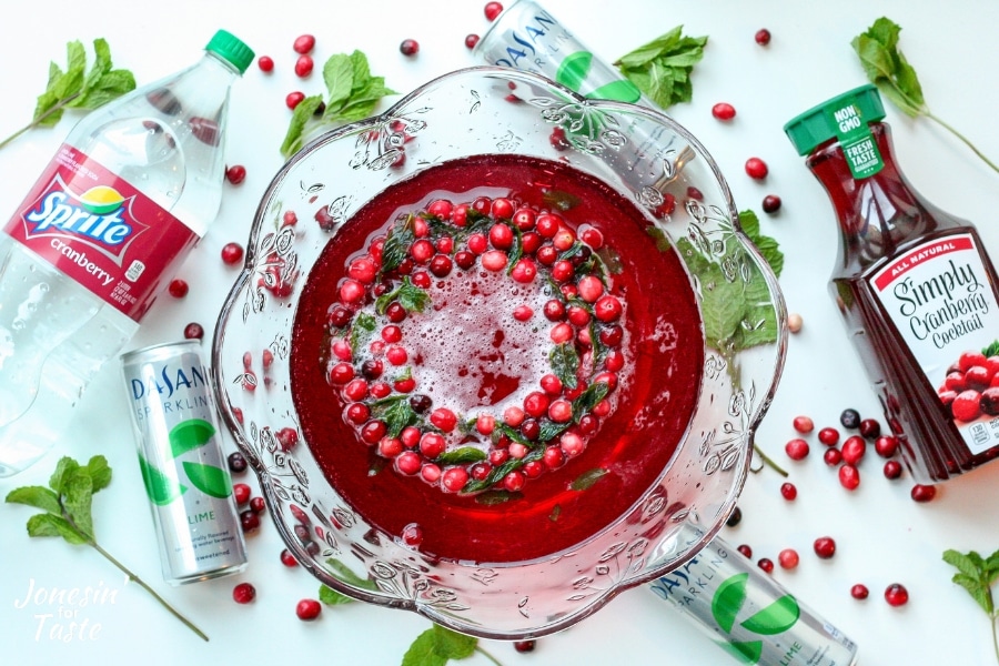 A bowl of cranberry holiday punch with a decorative ice ring in it.