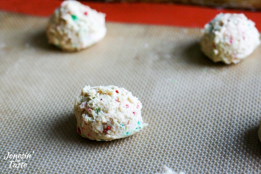 Christmas Sprinkle Pudding Cookie dough on a baking mat