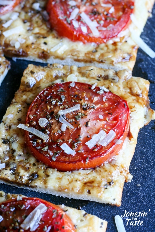 A slice of fresh tomato pizza