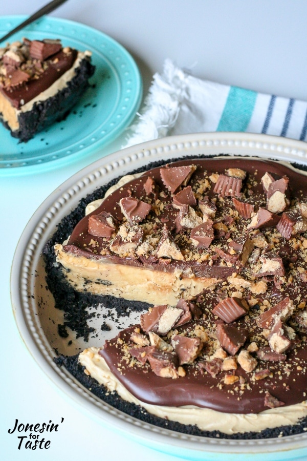 A no bake peanut butter pie with a slice missing