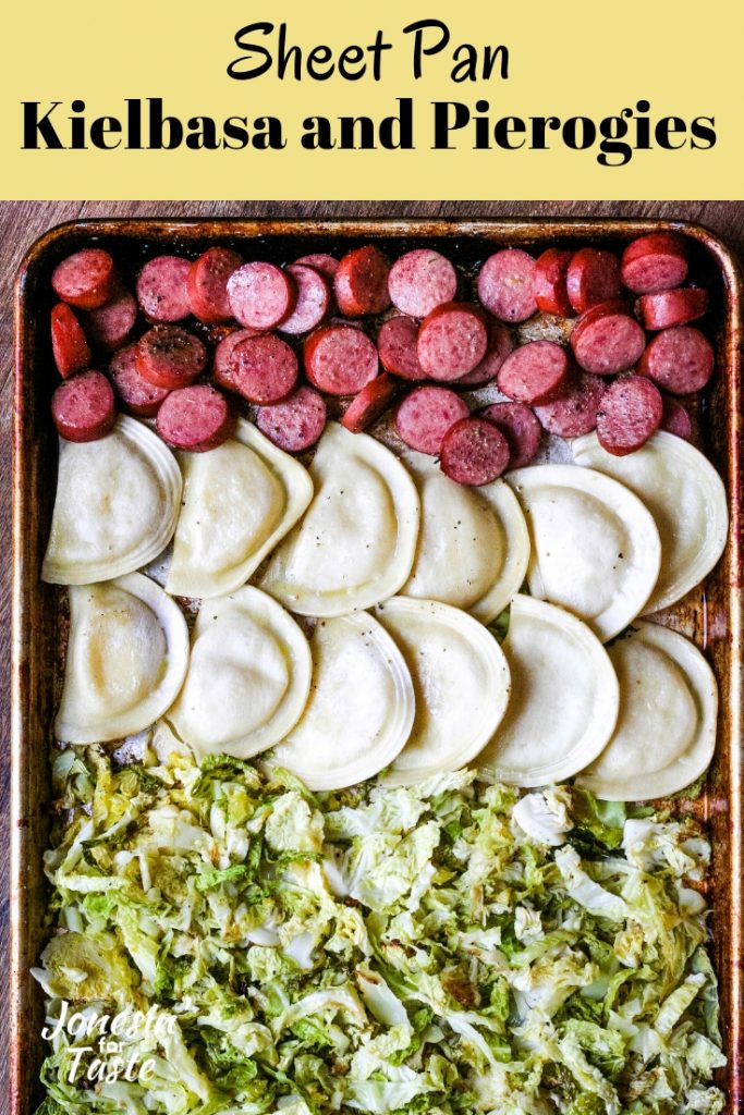 kielbasa, pierogies, and cabbage on a cookie sheet