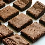 cut brownies on a piece of parchment paper