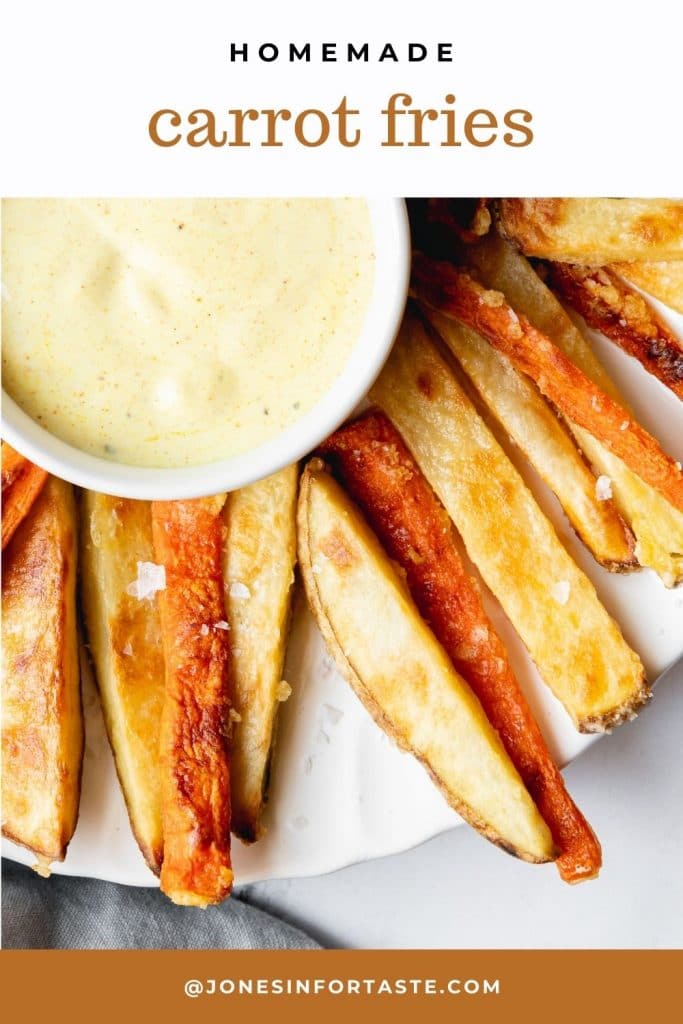 dipping a carrot fry into a small white bowl with a light yellow curry mayo dipping sauce. Text above says homemade carrot fries