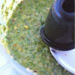 processed chimichurri in the bowl of a food processor