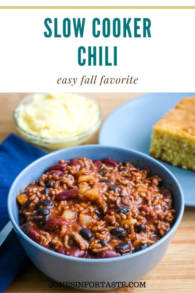a bowl full of beef and bean chili next to a plate of cornbread and small bowl of honey butter. Text above the photo says slow cooker chili easy fall favorite