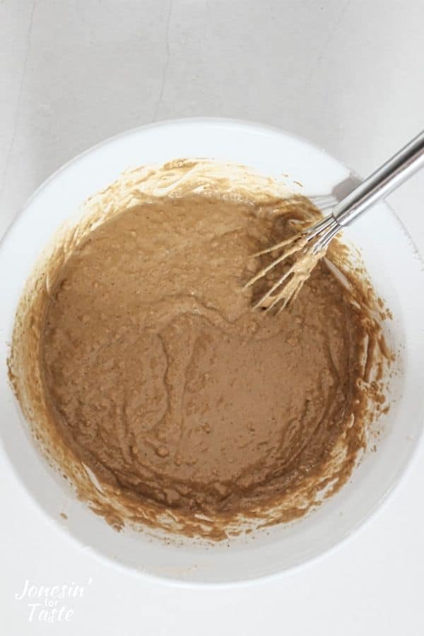 gingerbread batter mixed together in a white bowl