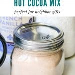 a small mason jar filled with hot cocoa mix. Text above it says homemade hot cocoa mix perfect for neighbor gifts