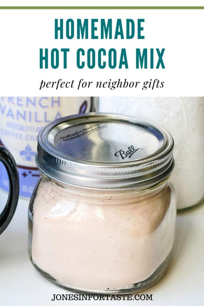 a small mason jar filled with hot cocoa mix. Text above it says homemade hot cocoa mix perfect for neighbor gifts
