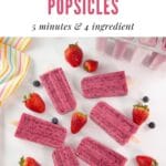 pink fruit popsicles on a white background with strawberries and blueberries around them